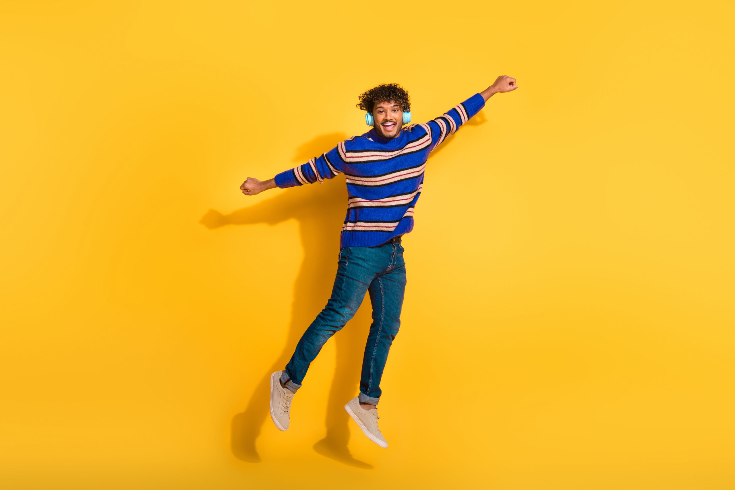 Full,Size,Photo,Of,Pretty,Young,Male,Headphones,Flying,Superhero